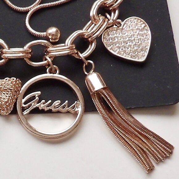 Guess Rose Gold Colored Charm Bracelet Adjustable Heart Tassel Question Mark NWT - Picture 3 of 5